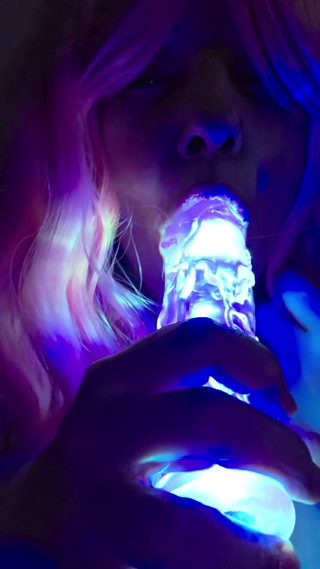Sucking on my Lighted Dildo