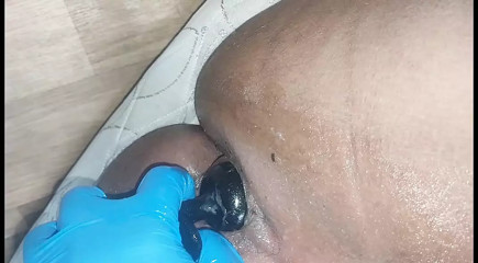 Masturbating chub removes big 50mm buttplug out of tight asshole
