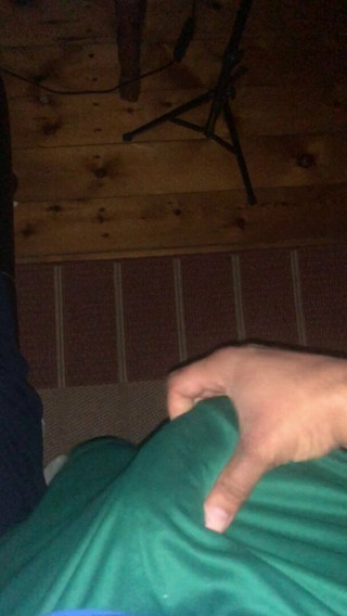 playing with my hard cock thru shorts
