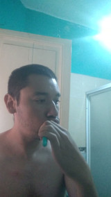 Washing my face while caressing my nipples