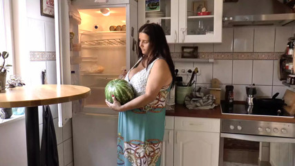An amazing German woman with dark hair riding a fat cock