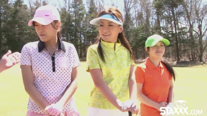 Cute Asian teen girls play a game of strip golf