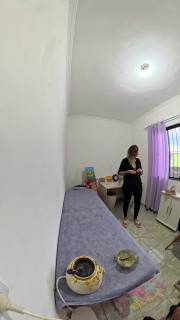 Female waxing with hot wax for bikini area and anus.