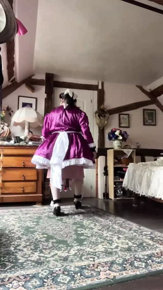 In a purple maid outfit for a day
