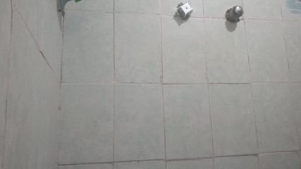 I'm having a great time masturbating in the shower while I'm bathing in nice, warm water