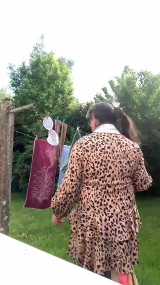 In an outfit with a little leopard print dress to go get my laundry. thumbnail
