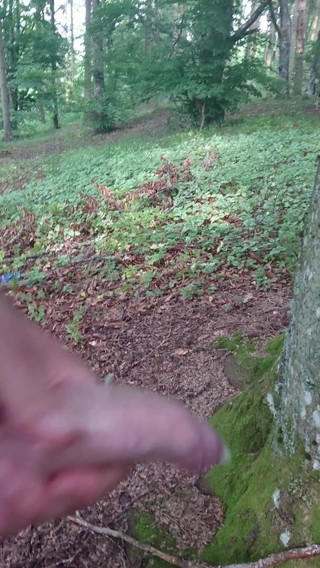 Cum into condom in the forest
