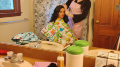 Emma the barberette colorful cape modeling season