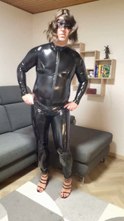 Naughty dancing and posing in catsuit
