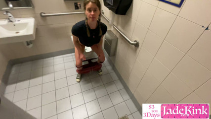 Pretty girlfriend sucking boyfriend's dick in a public toilet