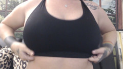 Boobs drops sports bra hands
