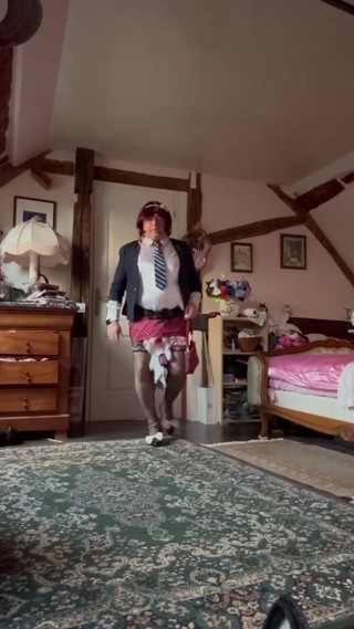 Dressed in a new short checkered mini skirt for an evening thumbnail