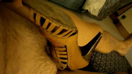 My friend loaned me his wife's brown peep-toe shoes