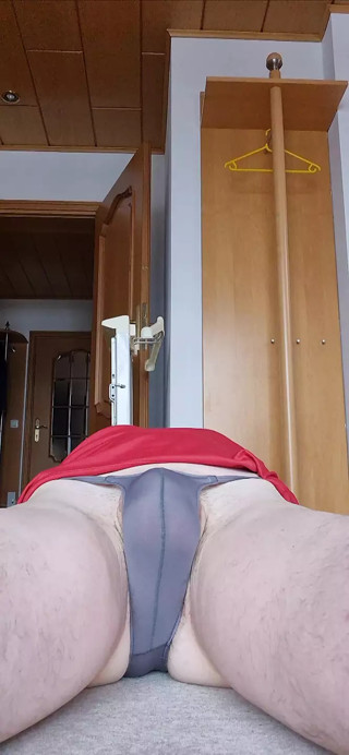My morning bulge as I stretch my back, in my tiniest piece.