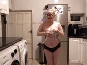 Wife stripping naked in the kitchen
