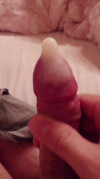 Big cumshot in condom