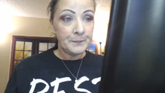 Doing make up dangling smoke