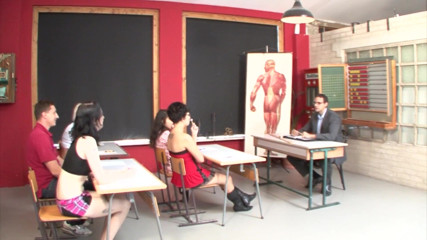 Brunette teen penetrated on the college desk by the teacher