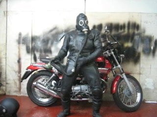 leather and rubber masked motorcycle wank