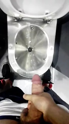 Huge cumshot in the toilet on the train