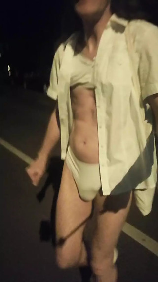Bella does a night time lingerie walk down the street thumbnail