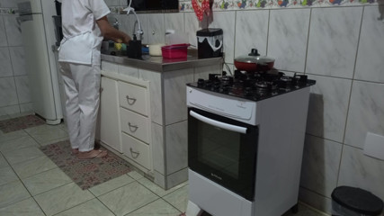 Maid had her ass used while washing dishes.