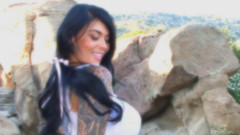 Tera Patrick slowly strips outdoors