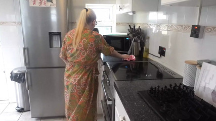 Naughty Housewife Cleaning In The Kitchen