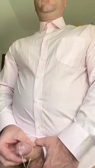 Businessman has quick wank with cumshot