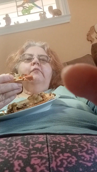 Naughty me gobbling up pizza