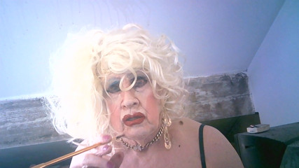 Desperate shitcunt sissy Sarah tries to look a Lady, smoking with a holder, but sadly fails - she just looks like a desperate thumbnail