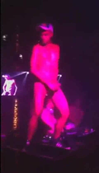 Lad dance on DJ table with hard cock