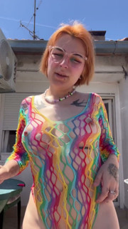 Smoking in a Rainbow Fishnet on the Balcony