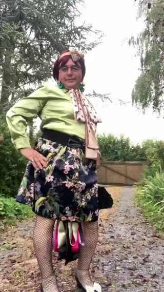 In an outfit with a new floral skirt for an evening out thumbnail