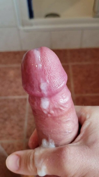 Letting cum drip from my swollen cockhead
