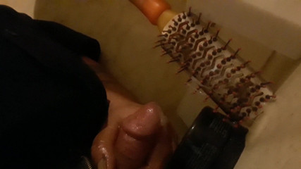 Big cum load on her hair  brush