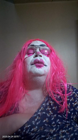 TV clown slut plays with her breasts for you thumbnail