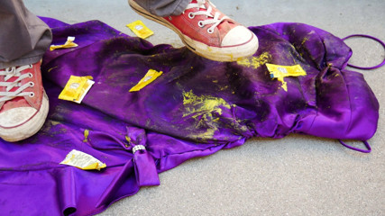 Smashing mustard packets on Samantha's prom dress