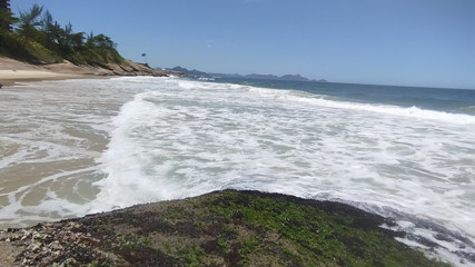 massaging my feet on the beach