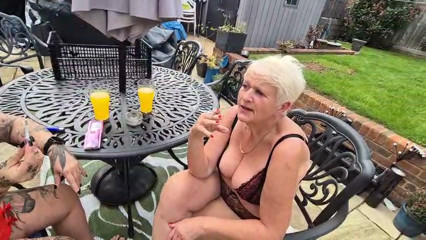 Joolz and Cheyenne Rose smoking in the garden