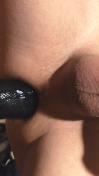 Horny little ass fucked by a huge black dildo and likes it