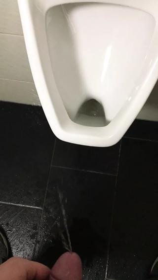 Pissing over the toilet at work