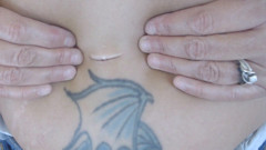 Belly button digging stretching finger'n