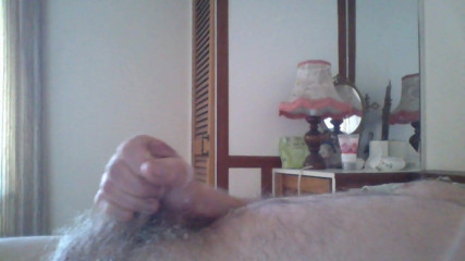 bear wanking  and cumming  in bed