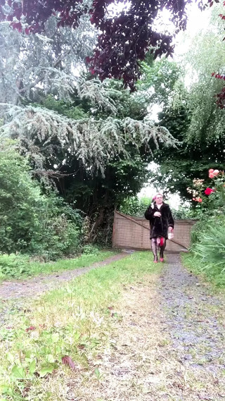 In outfit with a little dress with flowers and a coat for an evening