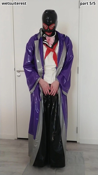 Putting on latex saint priest robe coat over schoolgirl sailor uniform and long rubber skirt thumbnail