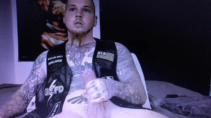 Heavily tattooed and pierced straight guy edging thick cock