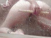 Dildo fucking my pussy while the water blasts my clit