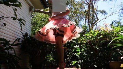sissy ray outdoors in pink sissy dress