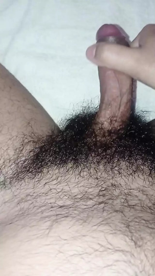 Greasing my hairy cock, I end up shooting a load of hot cum